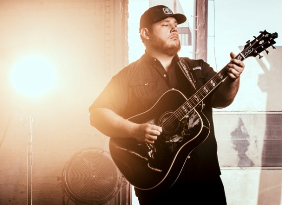 Luke Combs with his Guitar